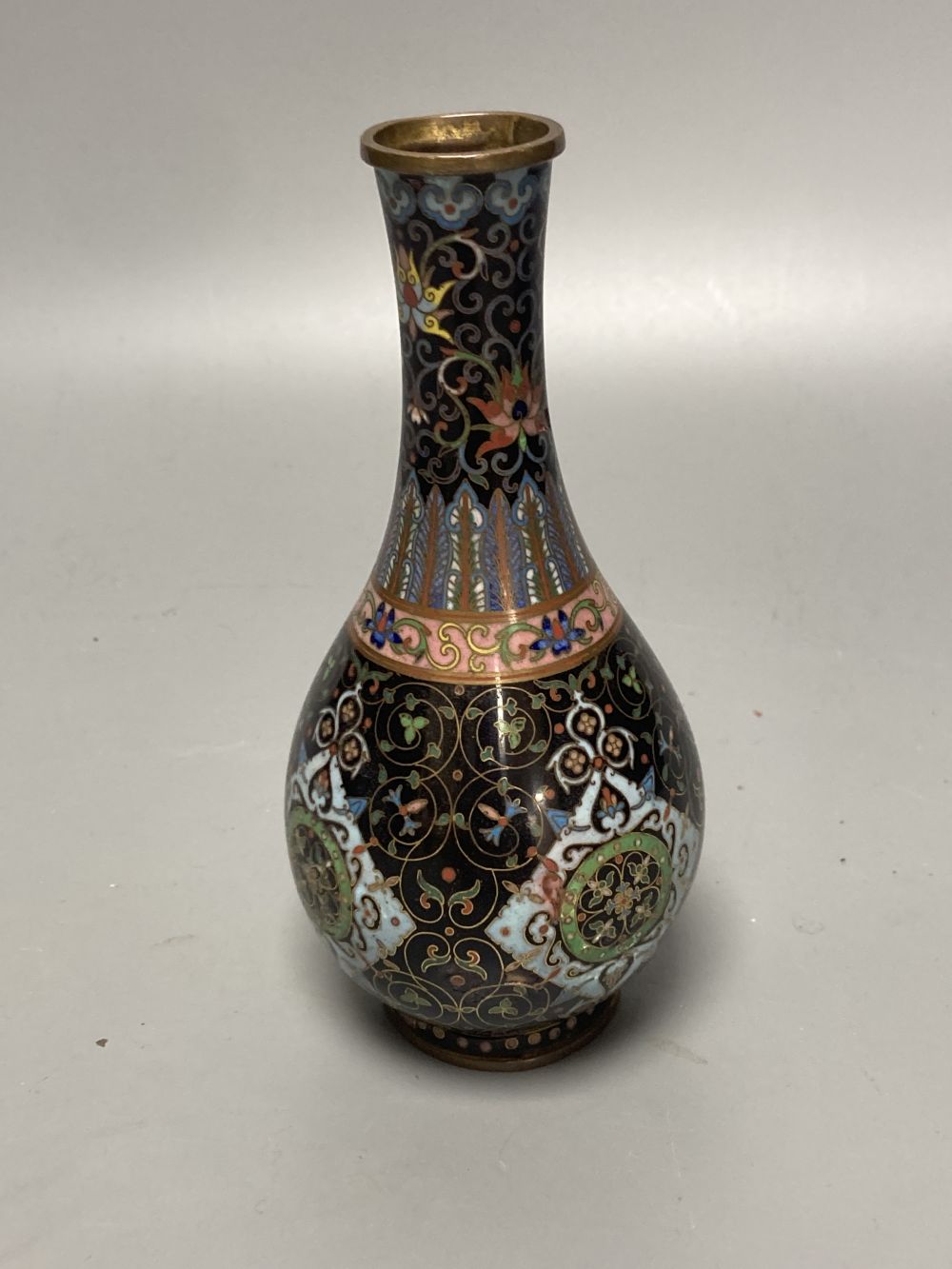 A Chinese powder blue ground vase and a similar cloisonne bottle vase, height 15cm